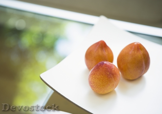Devostock Fresh Peaches On Table