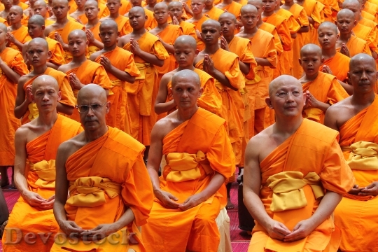 Devostock Monk Buddhists Sitting Elderly 0