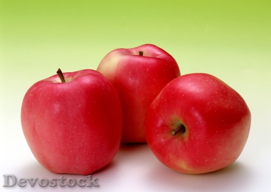 Devostock Red Apples Over White