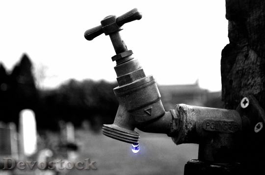 Devostock Tap Water Drop Background