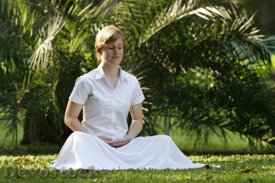 Devostock Woman Buddhist Meditate Girl